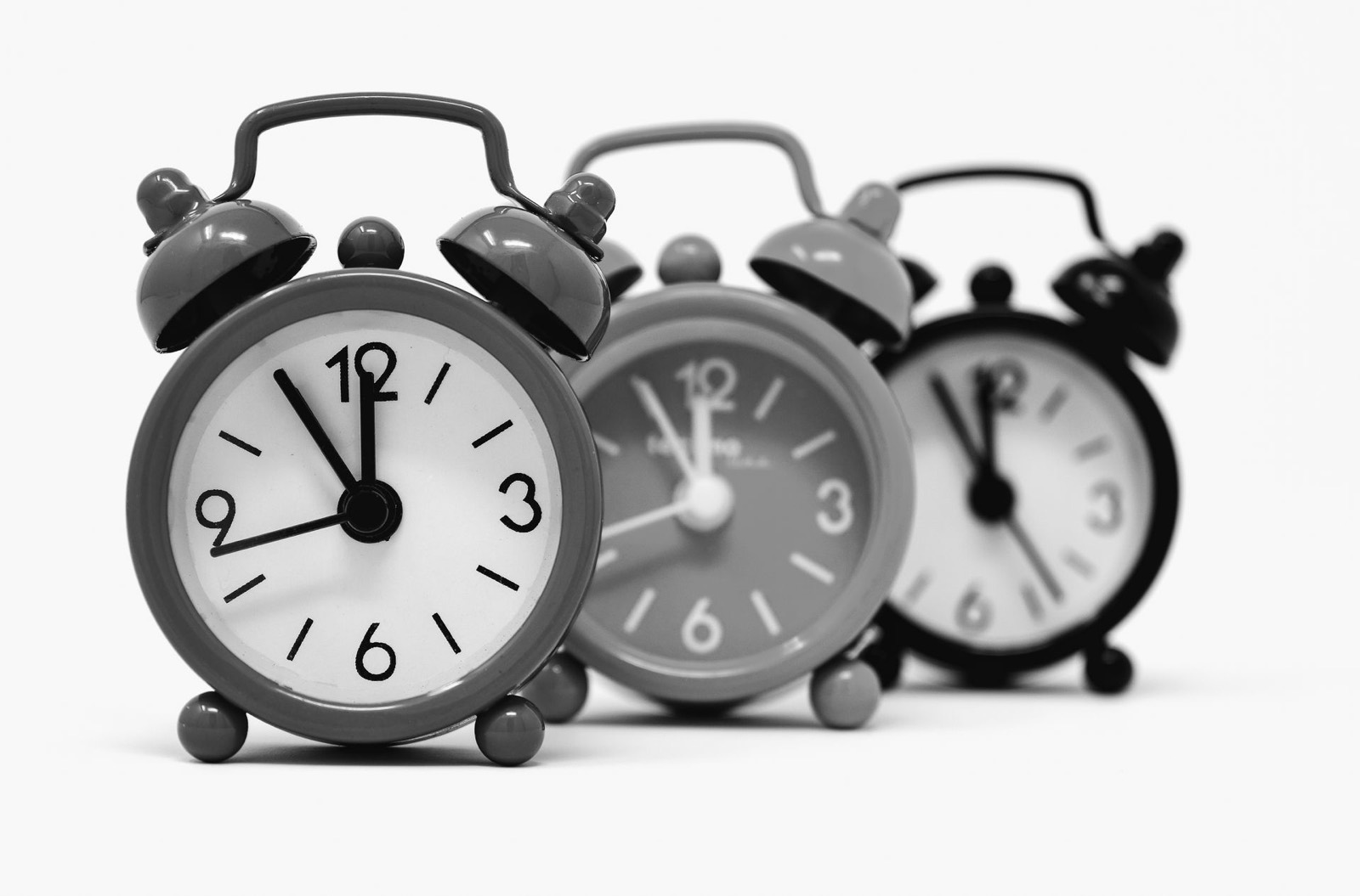 Three alarm clocks